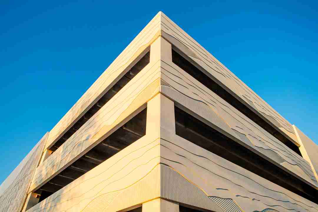 An upward view of corner edge of Asheville Regional Airport Parking Garage